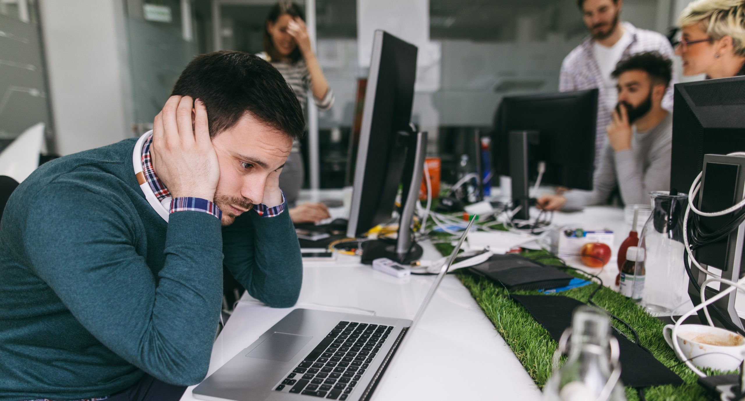 worker distracted in an open-plan office